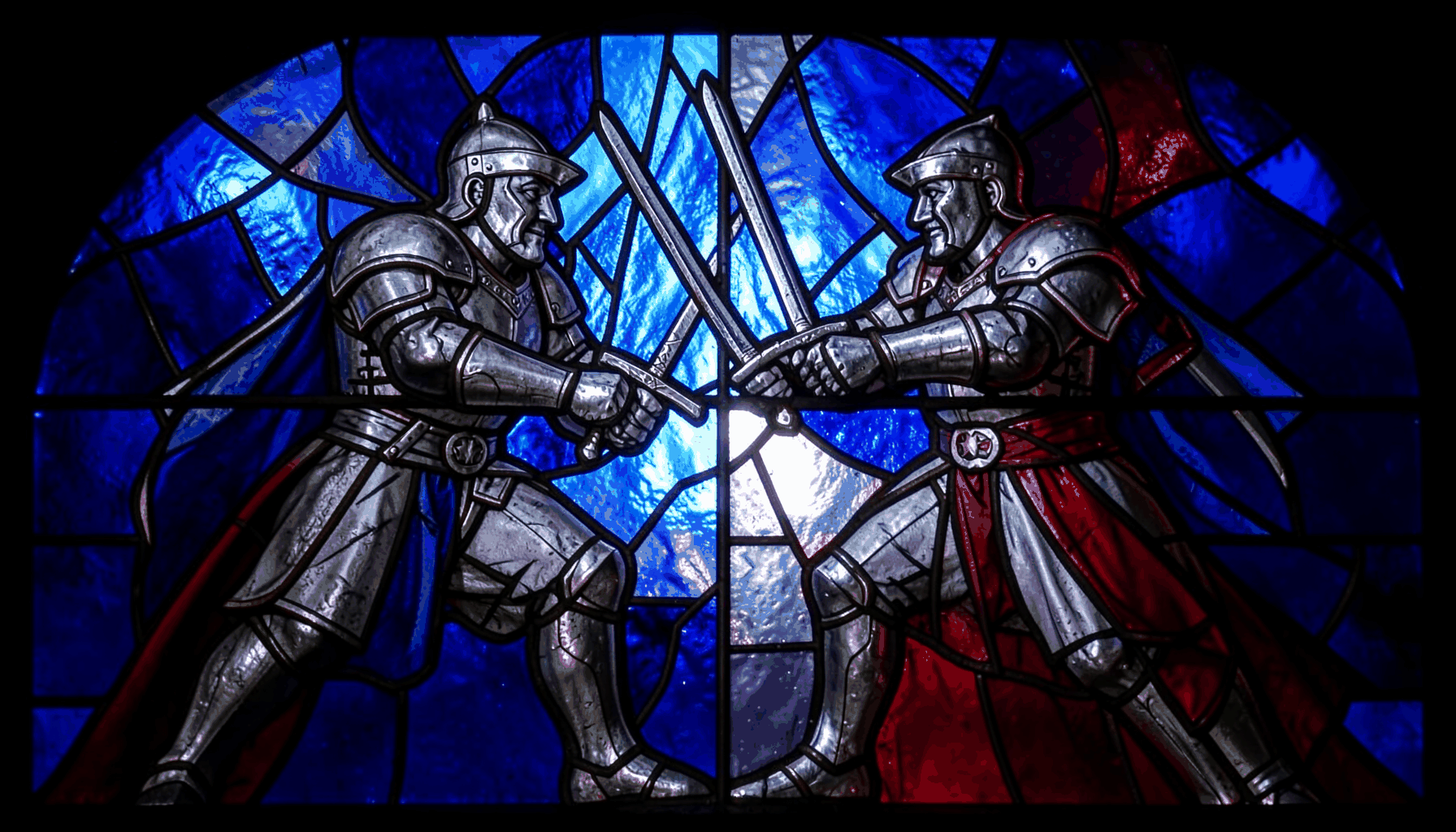 Stained-glass composition of two armoured knights clashing swords, rendered in bold leaded segments of deep navy blue, steel grey, and crimson red, with a dramatic, spirited mood